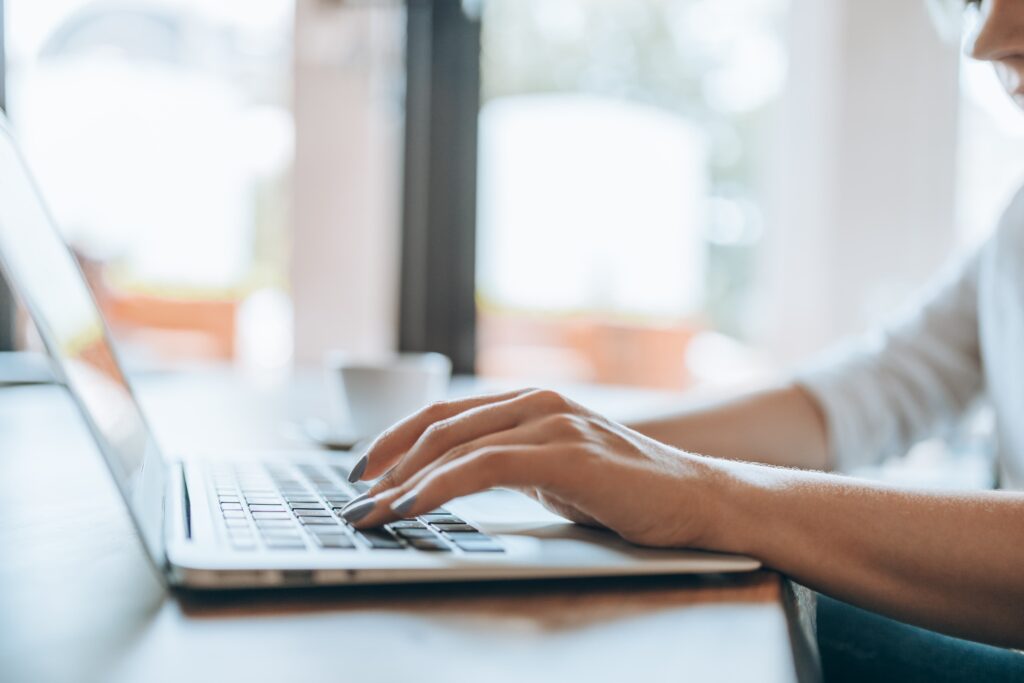 typing on laptop